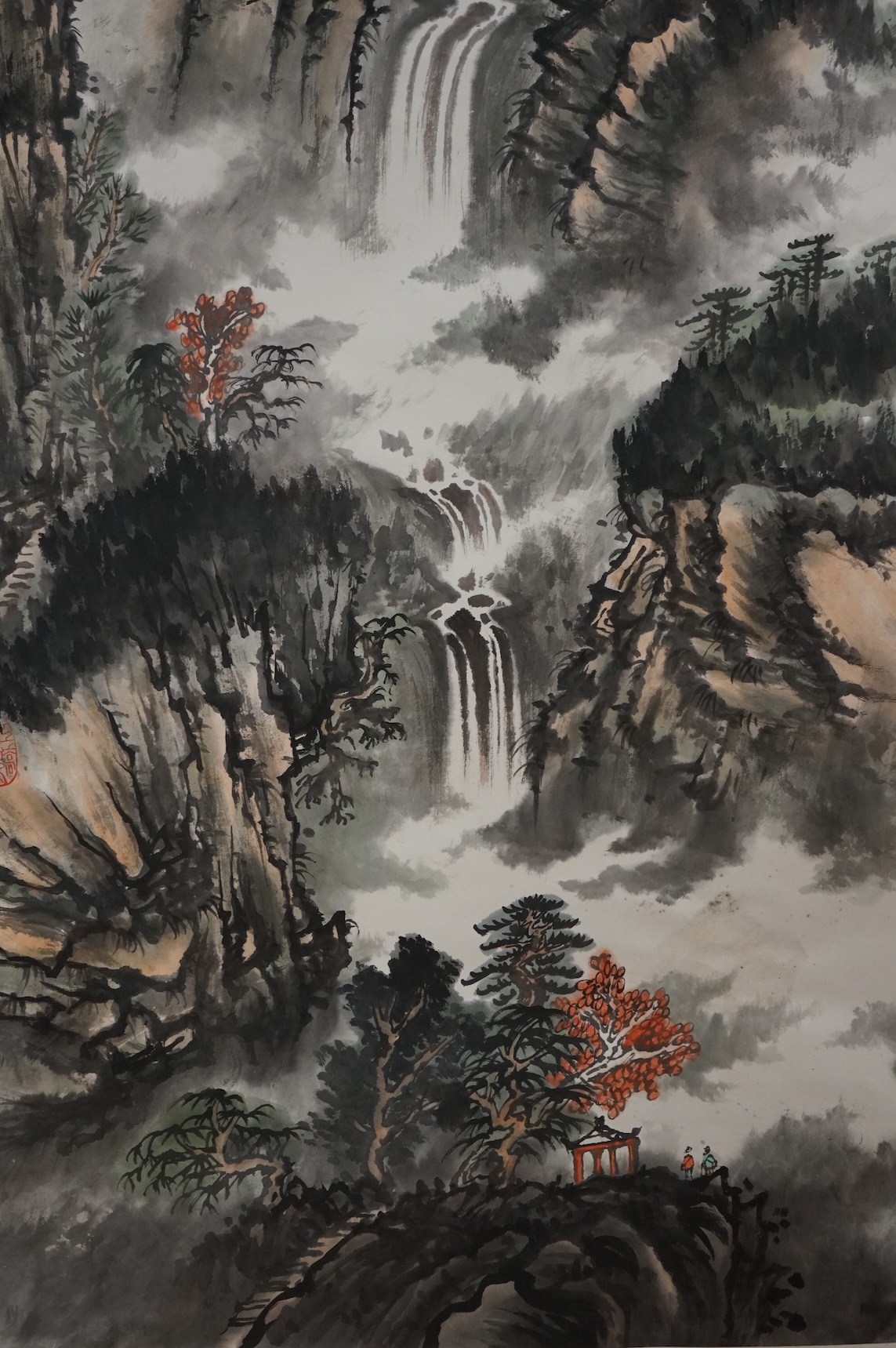 A Chinese scroll, hand painted with a mountainous landscape, 82cm wide